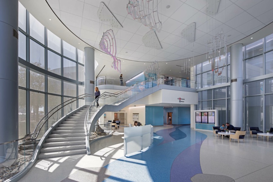 Main lobby with feature stair and suspended artwork